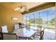 Covered lanai featuring a built-in grill and plenty of space for entertaining guests at 130 Los Gatos Pl, Kissimmee, FL 34759