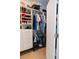 Walk-in closet with built-in shelving, hanging racks, and organized storage solutions at 1302 Moss Creek Ln, Davenport, FL 33896