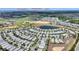 Extensive aerial view of a meticulously landscaped neighborhood near theme parks Magic Kingdom, Animal Kingdom, and Epcot at 1443 Bunker Dr, Davenport, FL 33836