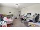 This flex space bedroom has carpet floors, natural light, and fun decor at 1443 Bunker Dr, Davenport, FL 33836