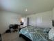 Bedroom featuring a double bed, desk, and two closets at 1648 Heart Bar Rd, Kissimmee, FL 34744