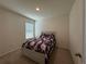 Bedroom with a double bed, one window, and carpeted floors at 1648 Heart Bar Rd, Kissimmee, FL 34744