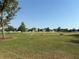 Expansive green space with walking paths, benches and landscaping within the community at 1648 Heart Bar Rd, Kissimmee, FL 34744