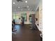Bright and spacious fitness center featuring large mirrors and a variety of exercise equipment at 1648 Heart Bar Rd, Kissimmee, FL 34744