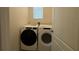 Bright laundry area with modern washer and dryer at 1648 Heart Bar Rd, Kissimmee, FL 34744