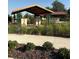 Outdoor community mailboxes with covered pavilions and landscaping at 1648 Heart Bar Rd, Kissimmee, FL 34744