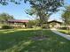 Beautiful community park featuring covered picnic areas surrounded by well-maintained green spaces and shade trees at 1648 Heart Bar Rd, Kissimmee, FL 34744
