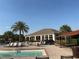 The community pool features lounge chairs, tables, and a picnic area for residents to enjoy at 1648 Heart Bar Rd, Kissimmee, FL 34744