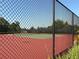 Community tennis court with a new fence at 1648 Heart Bar Rd, Kissimmee, FL 34744