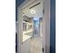 Bathroom featuring double vanity, step-in shower, tile floors, and recessed lighting at 1859 Shumard Ave, St Cloud, FL 34771