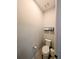 Powder room featuring a standard toilet with storage and neutral color scheme at 1859 Shumard Ave, St Cloud, FL 34771