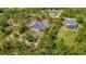 Aerial view of the property showcases the home's location within a lush, green environment at 19182 Seaview St, Orlando, FL 32833