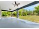 Large covered patio provides great views of the spacious backyard and the surrounding trees at 19182 Seaview St, Orlando, FL 32833