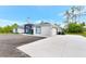 Beautiful one-story home featuring a white concrete driveway and attached garage at 19182 Seaview St, Orlando, FL 32833