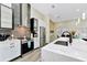 Bright kitchen featuring an island with marble countertops and stainless steel appliances at 19182 Seaview St, Orlando, FL 32833