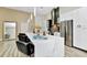 Bright kitchen with a large island, stainless steel appliances and modern countertops at 19182 Seaview St, Orlando, FL 32833