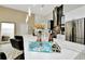 Kitchen island with chairs and welcome home sign on the counter at 19182 Seaview St, Orlando, FL 32833