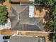 Aerial view of a house with a weathered roof at 207 Vervain Ave, Davenport, FL 33837