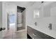 Bright bathroom with spacious walk-in shower and vanity with double sinks at 207 Vervain Ave, Davenport, FL 33837