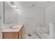Bathroom featuring a vanity, soaking tub, and natural light at 207 Vervain Ave, Davenport, FL 33837