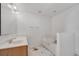 Bathroom featuring a vanity, soaking tub, and natural light at 207 Vervain Ave, Davenport, FL 33837