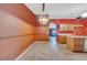 Spacious dining room showing access to other rooms at 207 Vervain Ave, Davenport, FL 33837