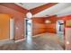 Open dining room with tile floors and unique lighting at 207 Vervain Ave, Davenport, FL 33837