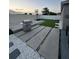 Outdoor backyard featuring a grill, basketball hoop, turfed area, and concrete at 209 Citrus Pointe Dr, Haines City, FL 33844