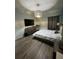 Cozy bedroom with modern decor, neutral colors, and ample natural light at 209 Citrus Pointe Dr, Haines City, FL 33844