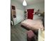 Bedroom with light gray walls, wood-look floors, and a plush comforter at 209 Citrus Pointe Dr, Haines City, FL 33844