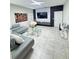 Modern living room featuring stylish decor, a large TV, and comfortable seating at 209 Citrus Pointe Dr, Haines City, FL 33844