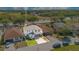 Charming two-story home with a well-manicured lawn and a two-car garage, set in a suburban neighborhood at 227 Sand Ridge Drive, Davenport, FL 33896