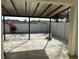 Covered back patio overlooking the fenced backyard with landscaping at 2439 White Lilly Dr, Kissimmee, FL 34747
