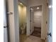 Powder room and walk in closet with wire shelving at 2439 White Lilly Dr, Kissimmee, FL 34747