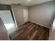 Bedroom with wood-look flooring and neutral wall color at 2439 White Lilly Dr, Kissimmee, FL 34747