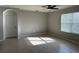 Bright living room with tile flooring, ceiling fan and natural light at 2439 White Lilly Dr, Kissimmee, FL 34747