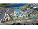 Community clubhouse featuring pool, lazy river, sun loungers, mature trees and convenient parking at 2605 Reading Trl, Kissimmee, FL 34746