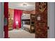 Themed bedroom with brick accent wall, bunk beds, and Harry Potter decor at 2605 Reading Trl, Kissimmee, FL 34746