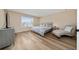 Relaxing bedroom with a chaise lounge, ceiling fan, and natural light from the window at 2764 Patrician Cir, Kissimmee, FL 34746
