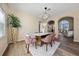 Elegant dining room featuring modern furnishings, stylish decor, and seamlessly connected living spaces at 2764 Patrician Cir, Kissimmee, FL 34746