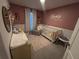 Charming Bedroom with a crib, changing table, and cozy decor at 2883 Narcoossee Commons Way, St Cloud, FL 34771