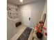 Charming entryway with modern decor, decorative mirror, and decorative flowers at 2883 Narcoossee Commons Way, St Cloud, FL 34771