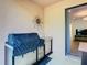 Outdoor grill area with stainless steel grill and view to the interior at 343 Scripps Ranch Rd, Poinciana, FL 34759