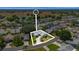 Aerial view of a residential area showcasing homes with lush greenery on an open sunny day at 508 Alcazar Ct, The Villages, FL 32159