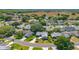 Scenic aerial view of a residential neighborhood with lush landscaping and well-maintained homes at 508 Alcazar Ct, The Villages, FL 32159