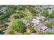 Beautiful aerial view of the community golf course and swimming pool at 508 Alcazar Ct, The Villages, FL 32159