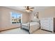 Well-lit bedroom features a large window and a classic dresser, creating a serene atmosphere at 508 Alcazar Ct, The Villages, FL 32159