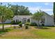 Charming home showcasing a well-maintained front yard and inviting curb appeal on a sunny day at 508 Alcazar Ct, The Villages, FL 32159