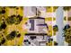 Aerial view of homes with solar panels, showcasing eco-friendly and energy-efficient living at 5118 Tiber Way, St Cloud, FL 34771