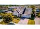 Stunning single-Gathering home with a well-manicured lawn, brick driveway, and two-car garage at 5118 Tiber Way, St Cloud, FL 34771